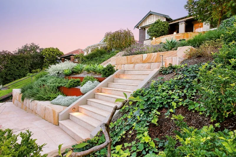 How to Deal With Sloped Yards: Terracing & Retaining Walls