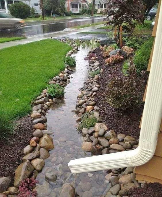 How to Build a Dry Creek Bed for Drainage & Visual Appeal