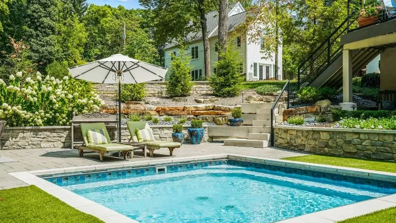 How to Landscape Around a Pool With Height & Depth