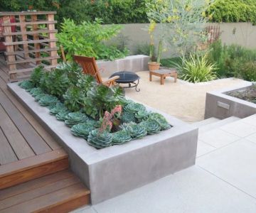 How to Use Planters to Add Height and Structure to Your Garden